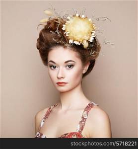 Beautiful woman with flowers. Perfect face skin. Beauty Portrait. Fashion photo