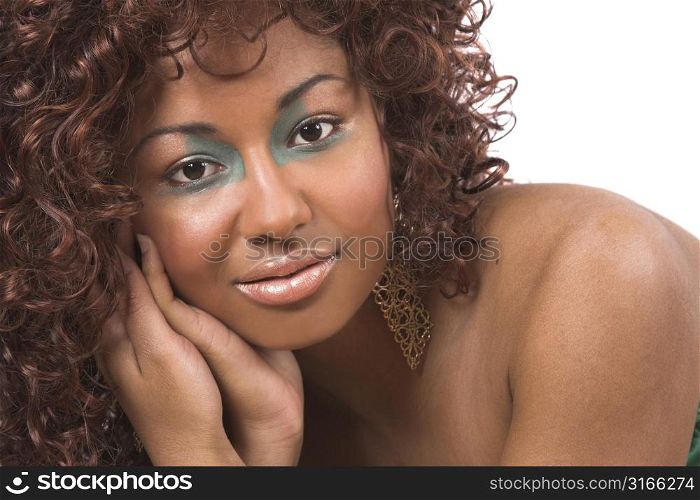 Beautiful woman with green makeup