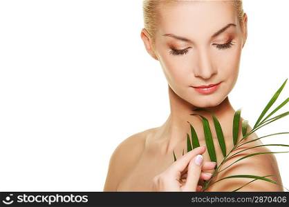 Beautiful woman with green plant