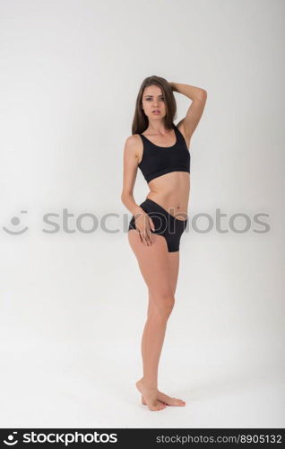 Beautiful woman with healthy body on white background