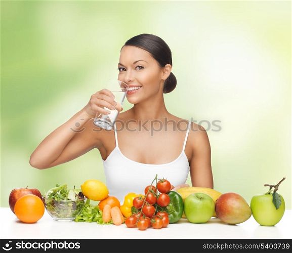 beautiful woman with healthy food and water