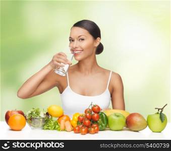 beautiful woman with healthy food and water