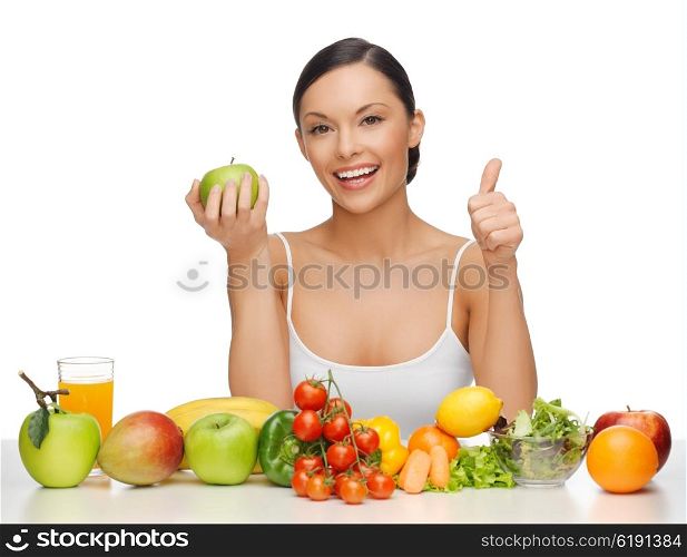 beautiful woman with healthy food showing thumbs up. woman with healthy food