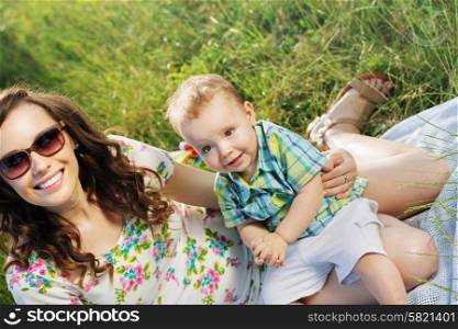 Beautiful woman with her cute little son