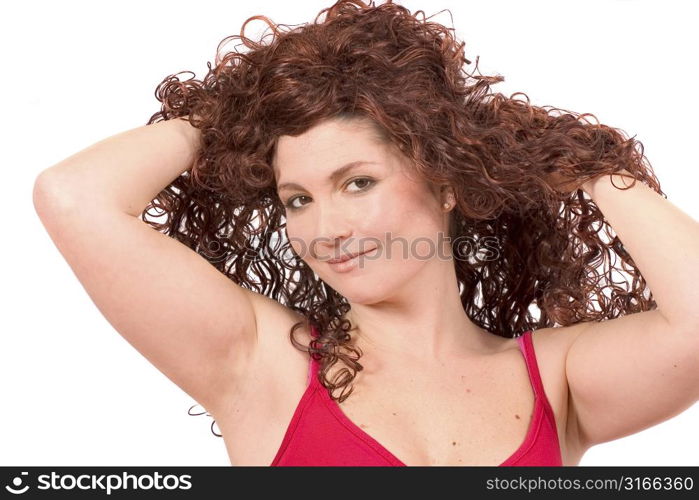 Beautiful woman with her hands in her hair