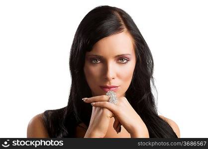 beautiful woman with long dark hair and silver rings looking in camera with her eyes