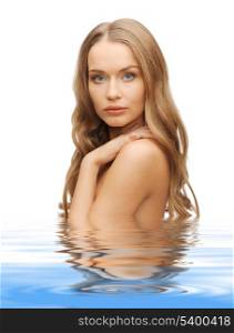 beautiful woman with long hair in water