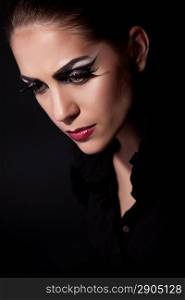 Beautiful woman with long straight hair and evening make-up. Fashion art photo