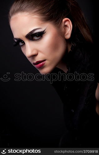 Beautiful woman with long straight hair and evening make-up. Fashion art photo