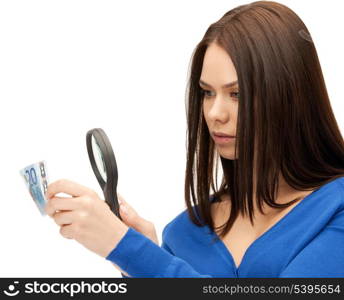 beautiful woman with magnifying glass and euro cash money..