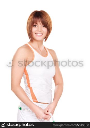 beautiful woman with measure tape over white