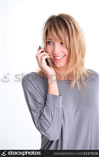 Beautiful woman with mobile phone on white background