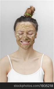 Beautiful woman with natural face mask clean skin rejuvenation isolated on white background. skin care. ecological mask. Beautiful woman with natural face mask clean skin rejuvenation isolated on white background. skin care. ecological mask.