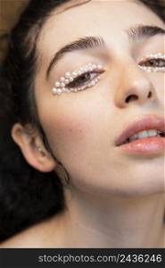 beautiful woman with pearls make up 14