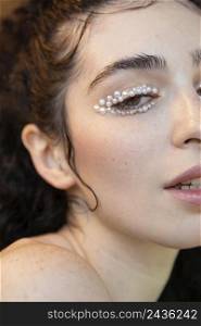 beautiful woman with pearls make up 9