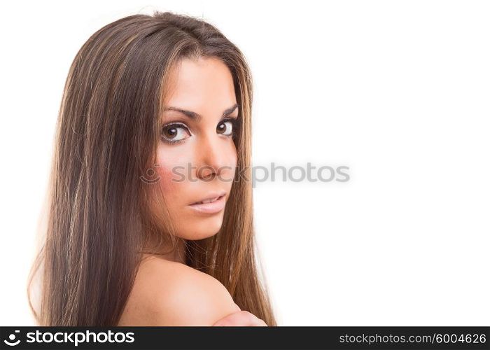 Beautiful woman with perfect skin posing over white