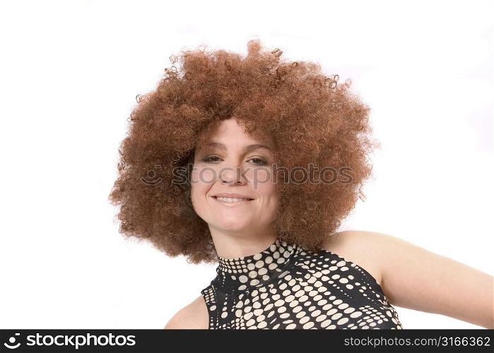 Beautiful woman with red afro wig