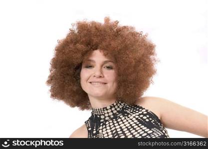 Beautiful woman with red afro wig