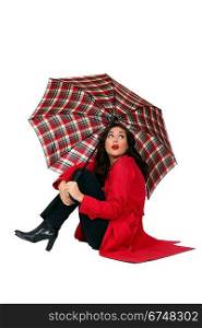 Beautiful woman with red coat and umbrella