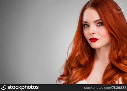 Beautiful Woman with Red Hair and bright makeup. Beautiful Woman with Red Hair