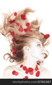 beautiful woman with rose petals in her hair