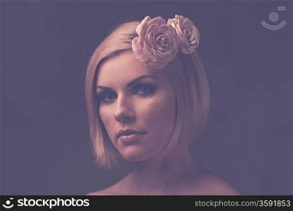 Beautiful woman with rosebud