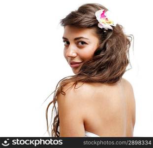 Beautiful woman with towel. Isolated over white.