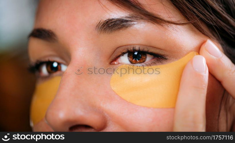 Beautiful Woman with Under Eye Beauty Pads.