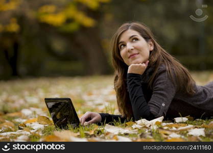 Beautiful woman working with a laptop in outdoor