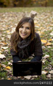 Beautiful woman working with a laptop in outdoor