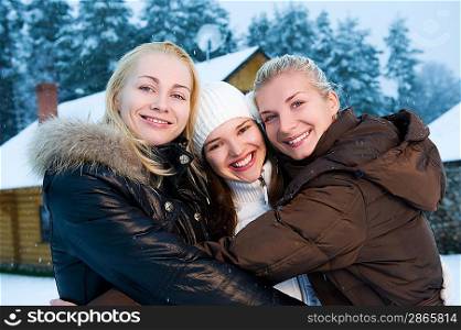 Beautiful women in winter clothing outdoors