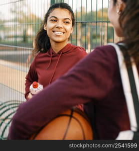 beautiful women walking home after basketball game