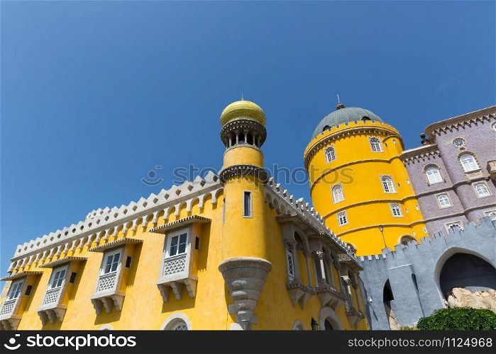 Beautiful yellow castle with towers against the sky. Beautiful castle