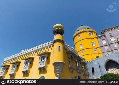 Beautiful yellow castle with towers against the sky. Beautiful castle
