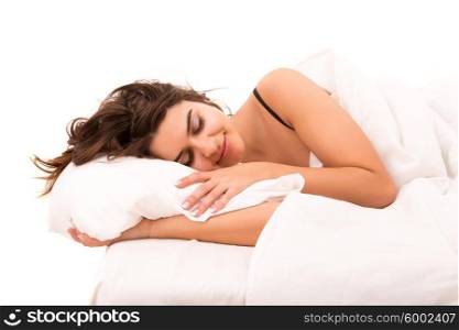 Beautiful young and beautiful woman resting in bed