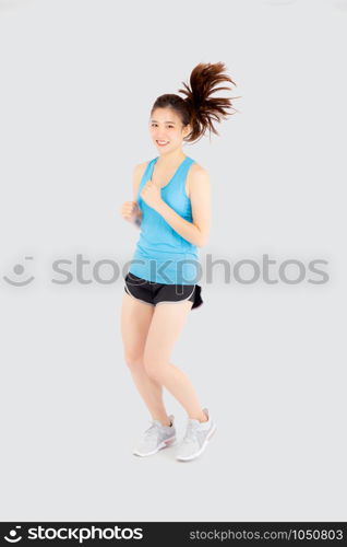 Beautiful young asian woman happy and smiling jogging isolated on white background, asia girl cheerful in sport is activity exercise cardio and workout with running for healthy, health concept.