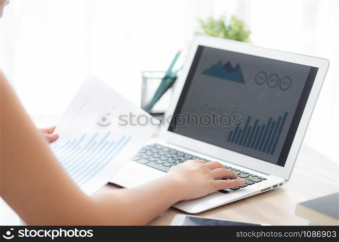 Beautiful young asian woman working laptop computer, businesswoman looking graph diagram analysis statistic data with excited and success, girl using notebook, business concept.