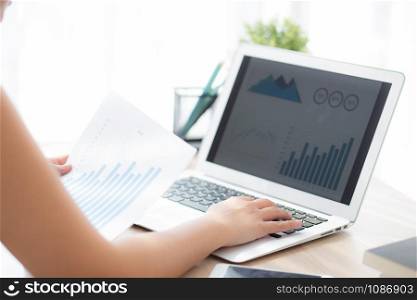Beautiful young asian woman working laptop computer, businesswoman looking graph diagram analysis statistic data with excited and success, girl using notebook, business concept.
