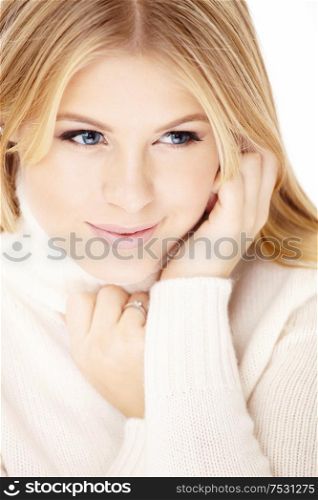 Beautiful young blonde with the mysterious sight, isolated