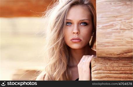 Beautiful young blonde woman. Outdoor portrait