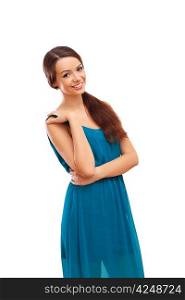 Beautiful young brunette woman in blue dress