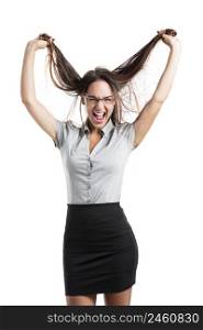 Beautiful young business woman grabbing her own hair, isolated over white backgrund