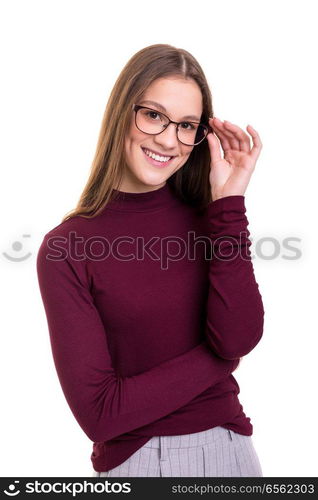 Beautiful young business woman posing isolated over white background