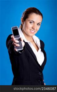 Beautiful young businesswoman calling by cellular phone.