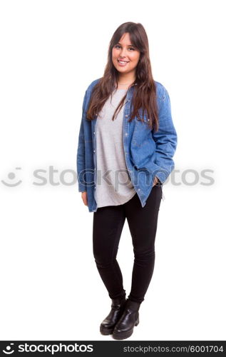 Beautiful young casual woman posing isolated over white