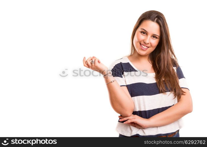 Beautiful young casual woman posing isolated over white