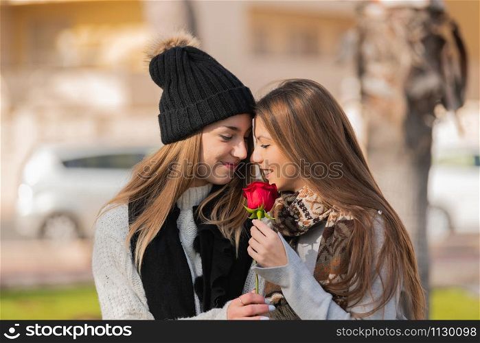 Beautiful young couple in a romantic way celebrating love.. Cute young couple celebrating love