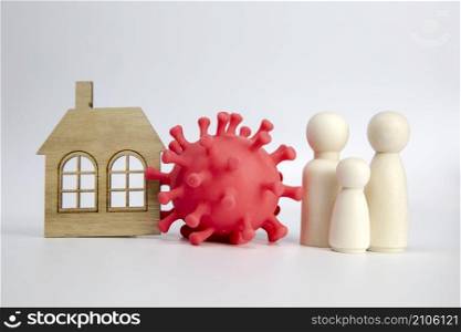 Beautiful young couple with child standing next to there house with bacteria COVID-19 , happy and healthy family safety at home coronavirus pandemic concept copy space white background space for text. Beautiful young couple with child standing next to there house with bacteria COVID-19 , happy and healthy family safety at home coronavirus pandemic concept copy space white background