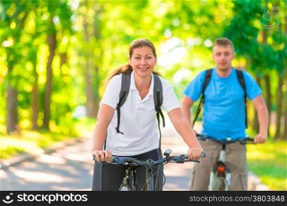 beautiful young cyclists in the park