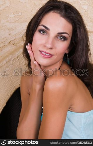 Beautiful young Czech woman in a turquoise dress